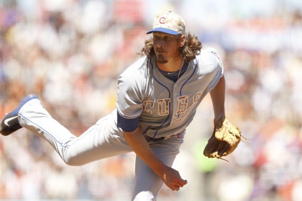 May 26, 2014; San Francisco, CA, USA; Chicago Cubs pitcher Jeff Samardzija (29) follows through on a pitch against the San Francisco Giants in the sixth inning at AT&T Park. Mandatory Credit: Cary Edmondson-USA TODAY Sports