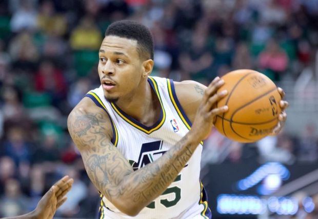 Jan 10, 2014; Salt Lake City, UT, USA; Utah Jazz shooting guard Brandon Rush (25) controls the ball during the second half against the Cleveland Cavaliers at EnergySolutions Arena. The Cavaliers won 113-102. Mandatory Credit: Russ Isabella-USA TODAY Sports