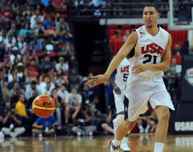 Aug 1, 2014; Las Vegas, NV, USA; USA Team White guard Klay Thompson (21) passes the ball during the USA Basketball Showcase at Thomas & Mack Center. Mandatory Credit: Stephen R. Sylvanie-USA TODAY Sports