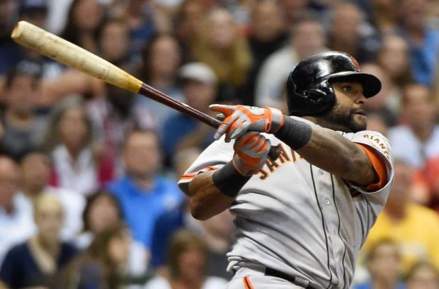 Aug 5, 2014; Milwaukee, WI, USA; San Francisco Giants third baseman Pablo Sandoval (48) hits a 3-run homer in the sixth inning against the Milwaukee Brewers at Miller Park. Mandatory Credit: Benny Sieu-USA TODAY Sports