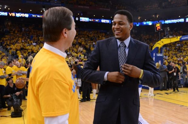 May 2, 2013; Oakland, CA, USA; Golden State Warriors owner Joe Lacob (left) talks with shooting guard Brandon Rush (4, right) before game six of the first round of the 2013 NBA Playoffs against the Denver Nuggets at Oracle Arena. Mandatory Credit: Kyle Terada-USA TODAY Sports