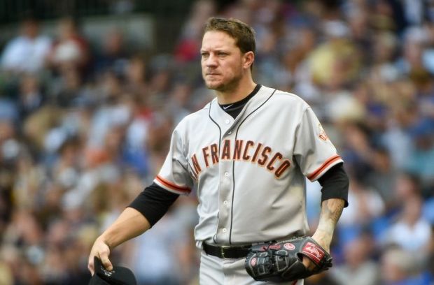 Aug 7, 2014; Milwaukee, WI, USA;  San Francisco Giants pitcher Jake Peavy (43) gets ready to pitch before the fourth inning against the Milwaukee Brewers at Miller Park. Mandatory Credit: Benny Sieu-USA TODAY Sports