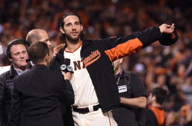 Oct 26, 2014; San Francisco, CA, USA; San Francisco Giants starting pitcher Madison Bumgarner waves to the crowd after defeating the Kansas City Royals during game five of the 2014 World Series at AT&T Park. Mandatory Credit: Kyle Terada-USA TODAY Sports
