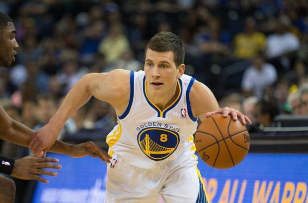 Mar 18, 2014; Oakland, CA, USA; Golden State Warriors guard Nemanja Nedovic (8) controls the ball against the Orlando Magic during the fourth quarter at Oracle Arena. The Golden State Warriors defeated the Orlando Magic 103-89. Mandatory Credit: Kelley L Cox-USA TODAY Sports
