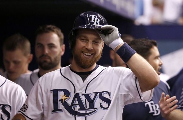 Jul 29, 2014; St. Petersburg, FL, USA; Tampa Bay Rays second baseman Ben Zobrist (18) smiles in the dugout after he hit a solo home run during the sixth inning against the Milwaukee Brewers at Tropicana Field. Mandatory Credit: Kim Klement-USA TODAY Sports
