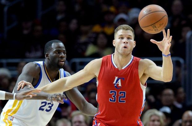 Dec 25, 2014; Los Angeles, CA, USA; Golden State Warriors forward Draymond Green (23) guards Los Angeles Clippers forward Blake Griffin (32) in the first half at Staples Center. Mandatory Credit: Jayne Kamin-Oncea-USA TODAY Sports