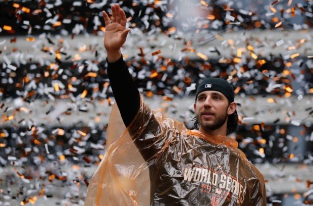 Oct 31, 2014; San Francisco, CA, USA; San Francisco Giants starting pitcher Madison Bumgarner waves to the crowd during the World Series victory parade on Market Street. Mandatory Credit: Kelley L Cox-USA TODAY Sports