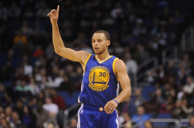 Nov 26, 2014; Orlando, FL, USA; Golden State Warriors guard Stephen Curry (30) celebrates a three-point basket against the Orlando Magic in the first quarter at Amway Center. Mandatory Credit: David Manning-USA TODAY Sports