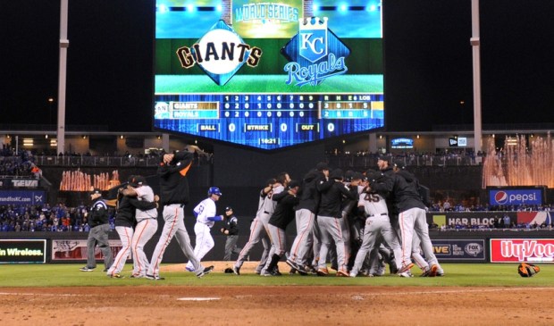 Oct 29, 2014; Kansas City, MO, USA; San Francisco Giants players celebrate on the field after defeating the Kansas City Royals during game seven of the 2014 World Series at Kauffman Stadium. Mandatory Credit: Peter G. Aiken-USA TODAY Sports