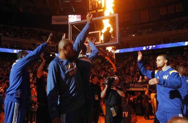 Jan 9, 2015; Oakland, CA, USA; Golden State Warriors guard Stephen Curry (30) is introduced before the start of the game against the Cleveland Cavaliers at Oracle Arena. The Warriors defeated the Cavaliers 112-94. Mandatory Credit: Cary Edmondson-USA TODAY Sports