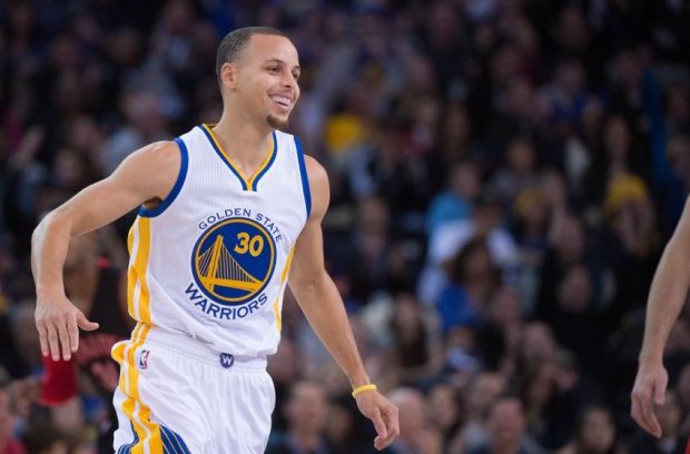 January 2, 2015; Oakland, CA, USA; Golden State Warriors guard Stephen Curry (30) celebrates during the first quarter against the Toronto Raptors at Oracle Arena. The Warriors defeated the Raptors 126-105. Mandatory Credit: Kyle Terada-USA TODAY Sports