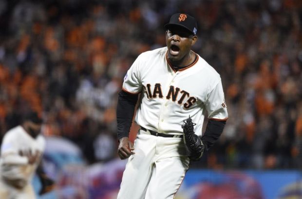 Oct 15, 2014; San Francisco, CA, USA; San Francisco Giants relief pitcher Santiago Casilla (46) celebrates after beating the St. Louis Cardinals in game four of the 2014 NLCS playoff baseball game at AT&T Park. Mandatory Credit: Kyle Terada-USA TODAY Sports