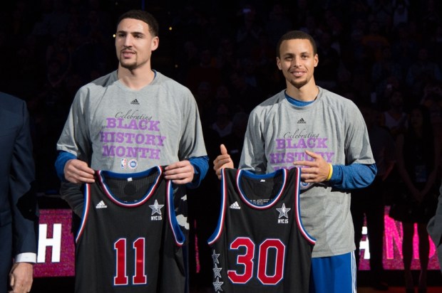 February 4, 2015; Oakland, CA, USA; Golden State Warriors guard Klay Thompson (11) and guard Stephen Curry (30) pose with the All-Star jerseys before the game against the Dallas Mavericks at Oracle Arena. Mandatory Credit: Kyle Terada-USA TODAY Sports