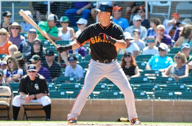 Mar 25, 2015; Salt River Pima-Maricopa, AZ, USA; San Francisco Giants second baseman Joe Panik (12) at bat in the first inning against the Colorado Rockies at Salt River Fields at Talking Stick. Mandatory Credit: Matt Kartozian-USA TODAY Sports