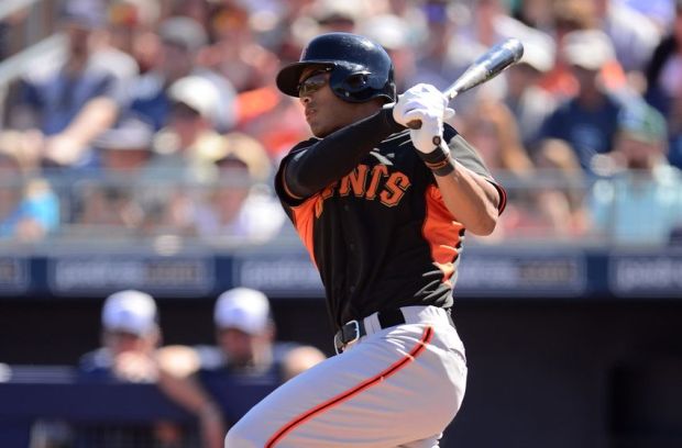 Mar 10, 2015; Peoria, AZ, USA; San Francisco Giants center fielder Justin Maxwell (43) swings the bat against the San Diego Padres at Peoria Sports Complex. Mandatory Credit: Joe Camporeale-USA TODAY Sports