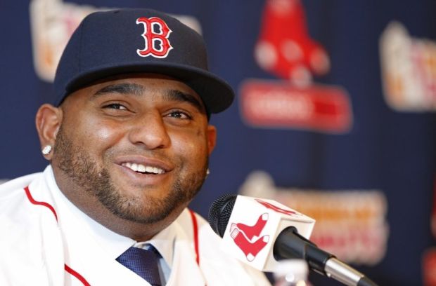 Nov 25, 2014; Boston, Ma, USA; Boston Red Sox third baseman Pablo Sandoval talks with the media during his introductory press conference at Fenway Park. Mandatory Credit: Greg M. Cooper-USA TODAY Sports