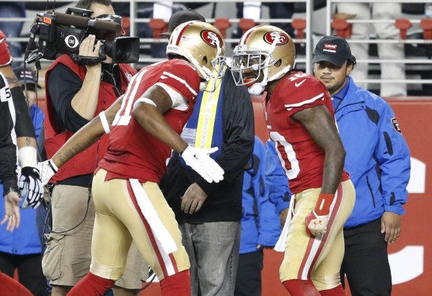 Dec 20, 2014; Santa Clara, CA, San Francisco 49ers wide receiver Bruce Ellington (10) celebrates with 49ers wide receiver Quinton Patton (11) after Ellington scored on a 8 yard pass during the second quarter against the San Diego Chargers USA;  at Levi's Stadium. Mandatory Credit: Bob Stanton-USA TODAY Sports