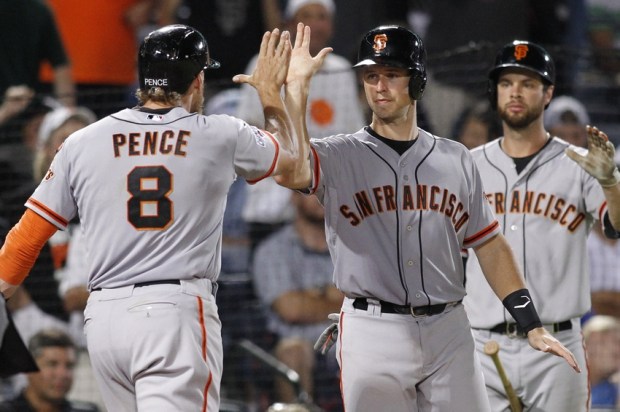 Aug 4, 2015; Atlanta, GA, USA; San Francisco Giants right fielder Hunter Pence (8) celebrates a home run with catcher Buster Posey (28) against the Atlanta Braves in the eighth inning at Turner Field. Mandatory Credit: Brett Davis-USA TODAY Sports